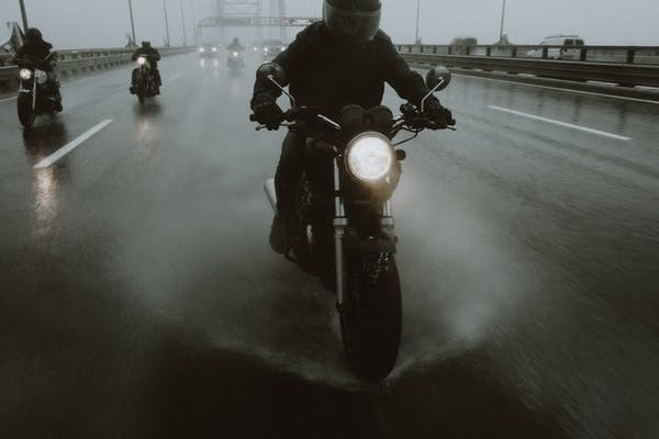 motorcyclists riding at night with their groups